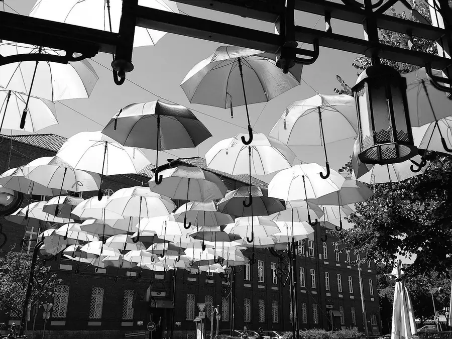 Umbrellas over a street, simulated as mono color vision